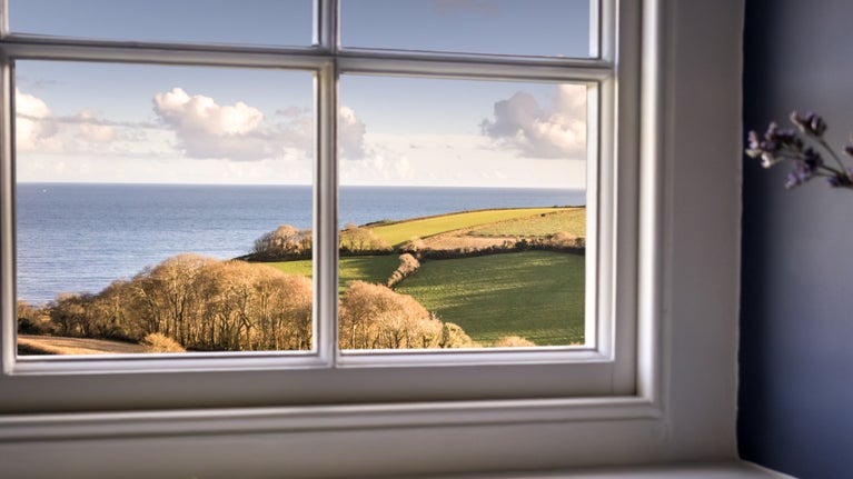The sea view from a window in the kitchen at Chenhalls Barn, Cornwall